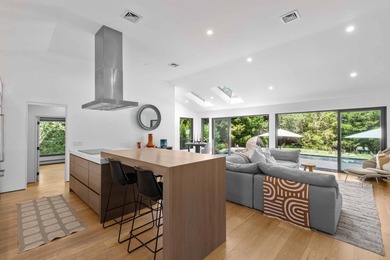 Discover a private Hamptons sanctuary where modern luxury meets - photo 8
