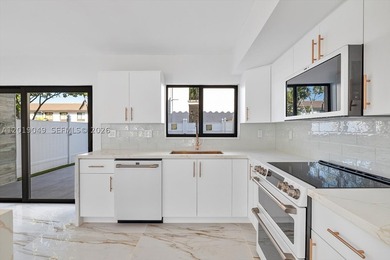 Exquisitely modern and totally renovated two story townhouse on - photo 7