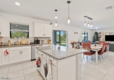 Enjoy vibrant sunsets and unbeatable convenience in this ideally - photo 3