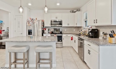 Enjoy vibrant sunsets and unbeatable convenience in this ideally - photo 5