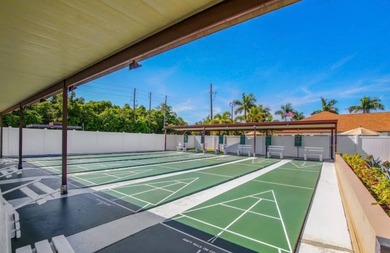 This Coastal style Home awaits you in the beautifully maintained - photo 44