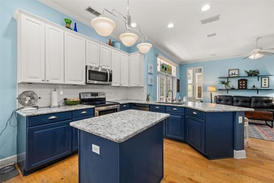 Located in Celebration, this 3-bedroom, 2.5-bathroom home backs - photo 15