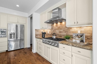 EXCLUSIVE HILLTOP VIEW HOME | Perched on a corner lot along a - photo 21
