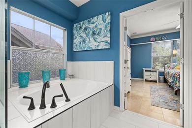 Located in Celebration, this 3-bedroom, 2.5-bathroom home backs - photo 29