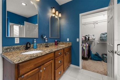Located in Celebration, this 3-bedroom, 2.5-bathroom home backs - photo 31