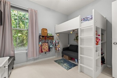 Located in Celebration, this 3-bedroom, 2.5-bathroom home backs - photo 33