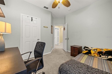 Located in Celebration, this 3-bedroom, 2.5-bathroom home backs - photo 36