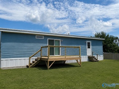 Discover this beautiful 2025 Mfg 3 bed / 2 bath home on a - photo 4