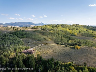 Sitting above the valley floor, this Kelly Highlands property - photo 11