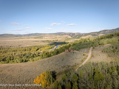 Sitting above the valley floor, this Kelly Highlands property - photo 12