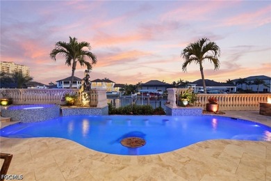 Paradise welcomes you to this direct Gulf access pool home - photo 2