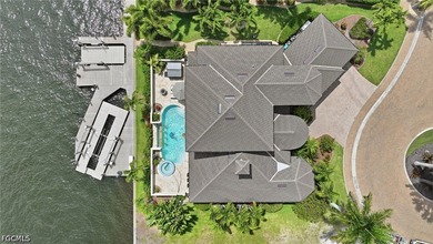 Paradise welcomes you to this direct Gulf access pool home - photo 6