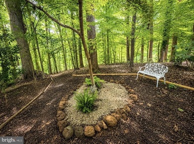 Tucked away on a quiet, wooded homesite, this beautiful 4BR/3 - photo 46