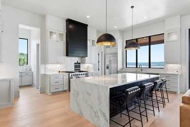 Designed around expansive lake views and effortless lake living - photo 10