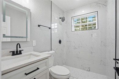 THE PROPERTY IS FULLY REMODELED! Beautiful 4 bedroom, 2 bath - photo 22