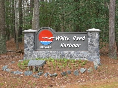 Level, wooded lot just under an acre, nestled in the golf cart - photo 4