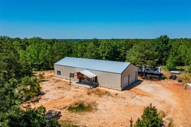Gorgeous home sitting on 8 acres of wooded tranquility with a - Lake Home Sale Pending in Winnsboro, Texas