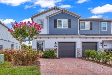 Virtually Staged. Welcome to this stunning end-unit townhome in - photo 3