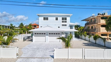 Welcome to a stunning, fully remodeled coastal retreat in the - photo 1