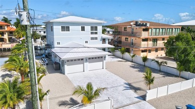 Welcome to a stunning, fully remodeled coastal retreat in the - photo 2