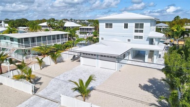 Welcome to a stunning, fully remodeled coastal retreat in the - photo 3