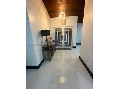 Welcome to this fully reimagined luxury residence in Davie - photo 6