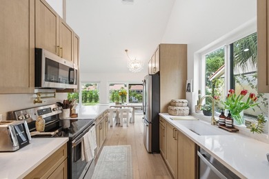 Welcome to this newly renovated Mediterranean/Spanish-style one - photo 6