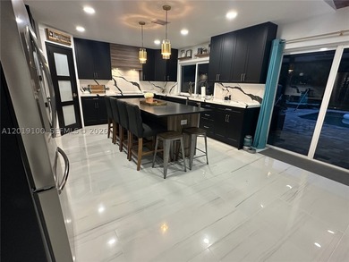 Welcome to this fully reimagined luxury residence in Davie - photo 7