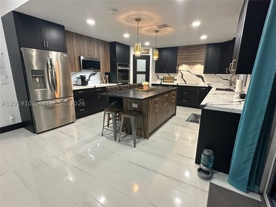 Welcome to this fully reimagined luxury residence in Davie - photo 8