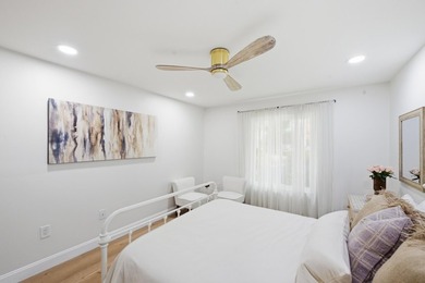 Welcome to this newly renovated Mediterranean/Spanish-style one - photo 9