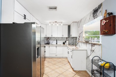 Welcome to this well-maintained 4-bedroom, 2-bathroom home - photo 11