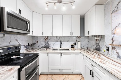 Welcome to this well-maintained 4-bedroom, 2-bathroom home - photo 12