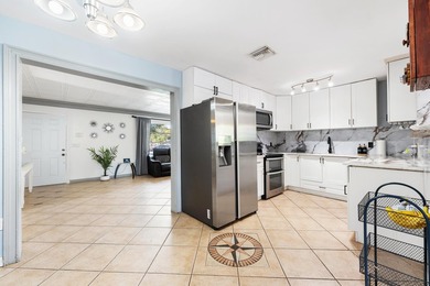 Welcome to this well-maintained 4-bedroom, 2-bathroom home - photo 14