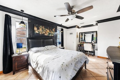 Welcome to this well-maintained 4-bedroom, 2-bathroom home - photo 18