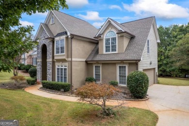 Lake Home For Sale in Flowery Branch, Georgia