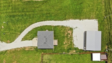 Check out this home nestled in the heart of Stockton, Missouri! - photo 2
