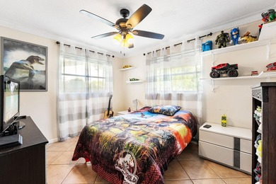 Welcome to this well-maintained 4-bedroom, 2-bathroom home - photo 24