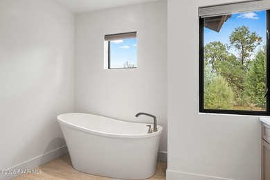 This beautifully designed 4-bedroom, 3.5-bath home offers an - photo 34