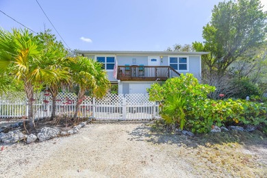 Located in the peaceful National Key Deer Refuge, this charming - photo 1