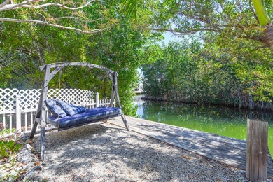 Located in the peaceful National Key Deer Refuge, this charming - photo 5