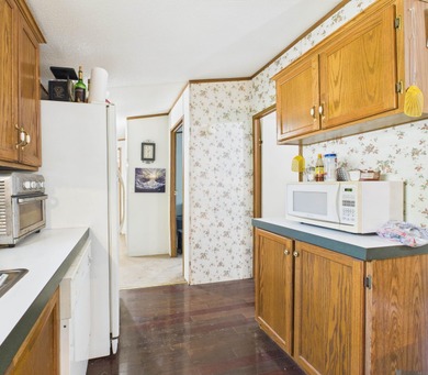 This 4 bedroom 2 bath home would be a perfect investment