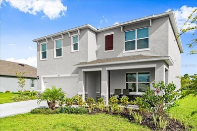 This 5-bedroom, 3-bath home sits on a spacious lakefront lot in - photo 1