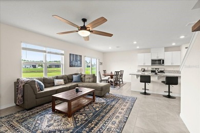 This 5-bedroom, 3-bath home sits on a spacious lakefront lot in - photo 4