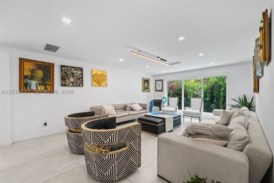 Located on one of Mid-Beach's most coveted tree-lined streets - photo 7