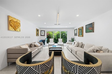 Located on one of Mid-Beach's most coveted tree-lined streets - photo 8