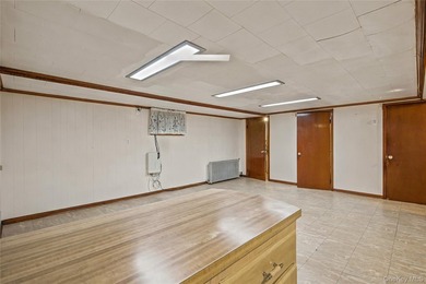 Welcome to this well-maintained two-family home offering an - photo 20
