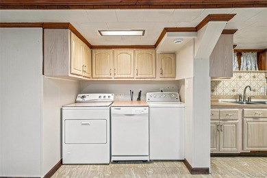 Welcome to this well-maintained two-family home offering an - photo 21
