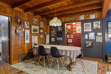 Welcome to the charming Pink House on Park, a spacious and - photo 8