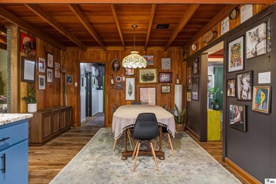 Welcome to the charming Pink House on Park, a spacious and - photo 10