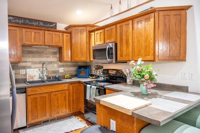 Each unit features a spacious, open~concept layout where the - photo 7
